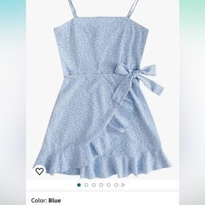 Girls blue and white floral sundress. Adjustable straps and zipper back closure.